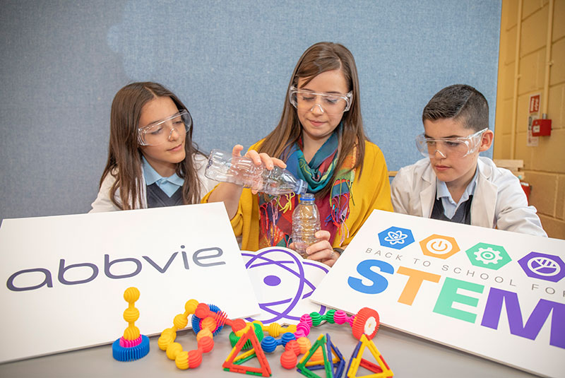 Minister for Education and Skills, Joe McHugh TD, with school principal Rory O'Donnell  and pupils with Robert Love, Columba McGarvey and Caroline McClafferty of the global biopharmaceutical company AbbVie at a special educational event at St Naul’s National School in Inver, Donegal today.  (North West Newspix)
